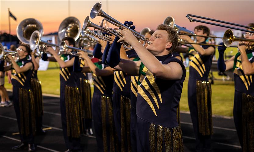 Bands perform on football field