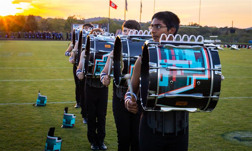 Bands perform on football field