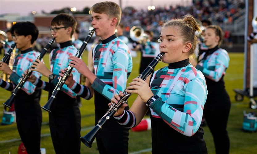 Bands perform on football field