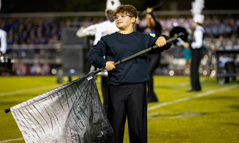 Bands perform on football field