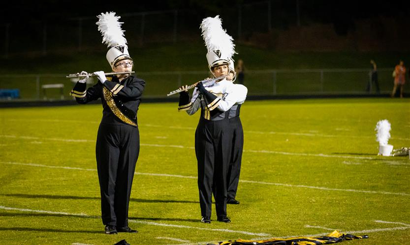 Bands perform on football field