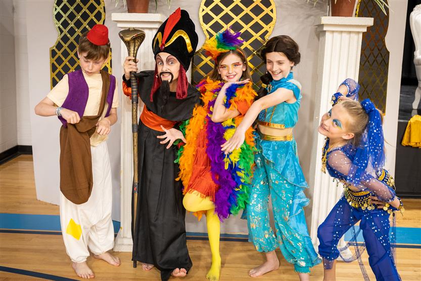 Students dressed in Aladdin costumes