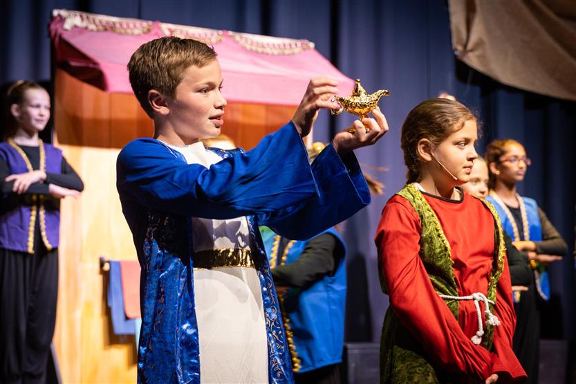 Students dressed in Aladdin costumes