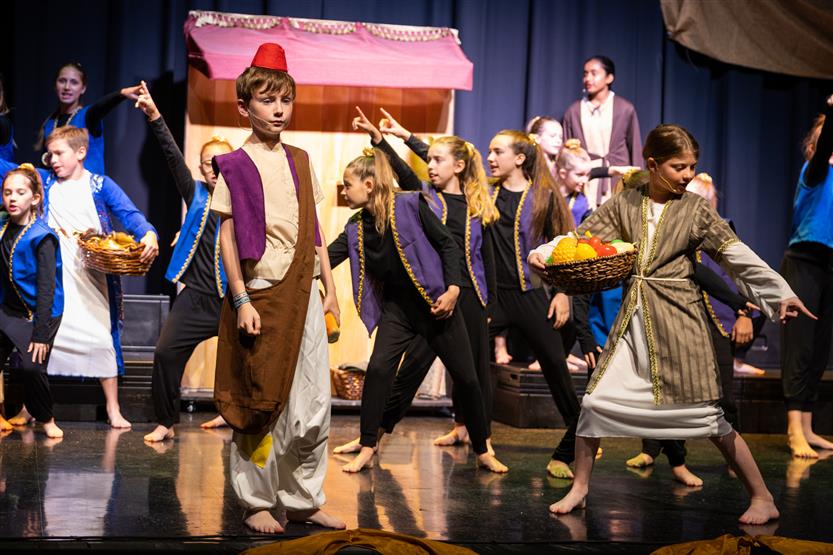 Students dressed in Aladdin costumes