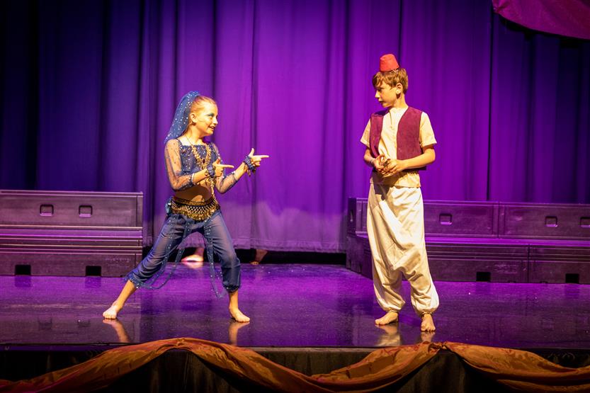 Students dressed in Aladdin costumes