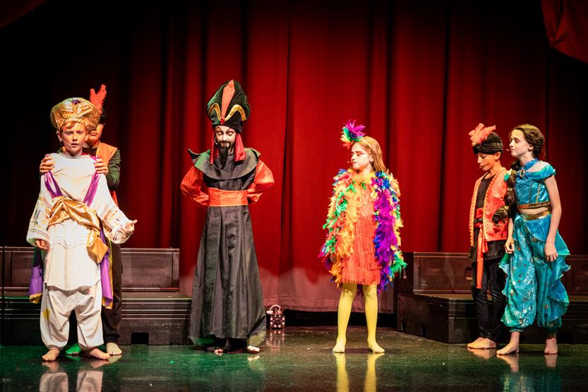 Students dressed in Aladdin costumes