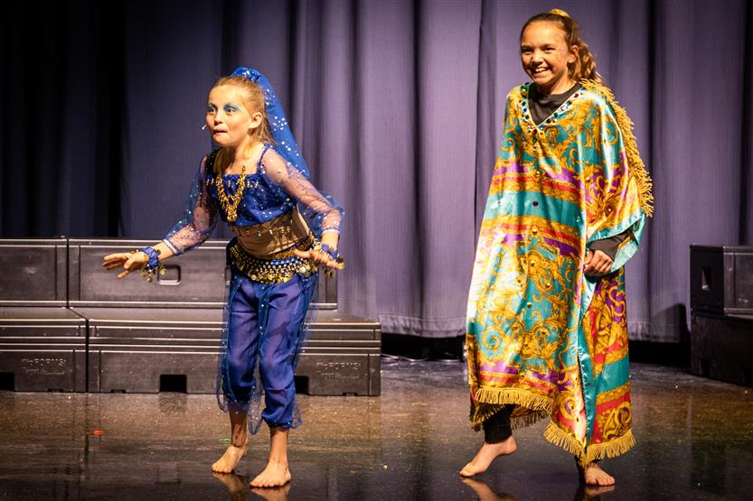 Students dressed in Aladdin costumes
