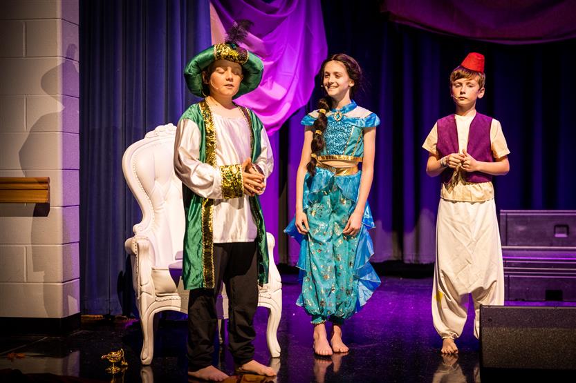 Students dressed in Aladdin costumes