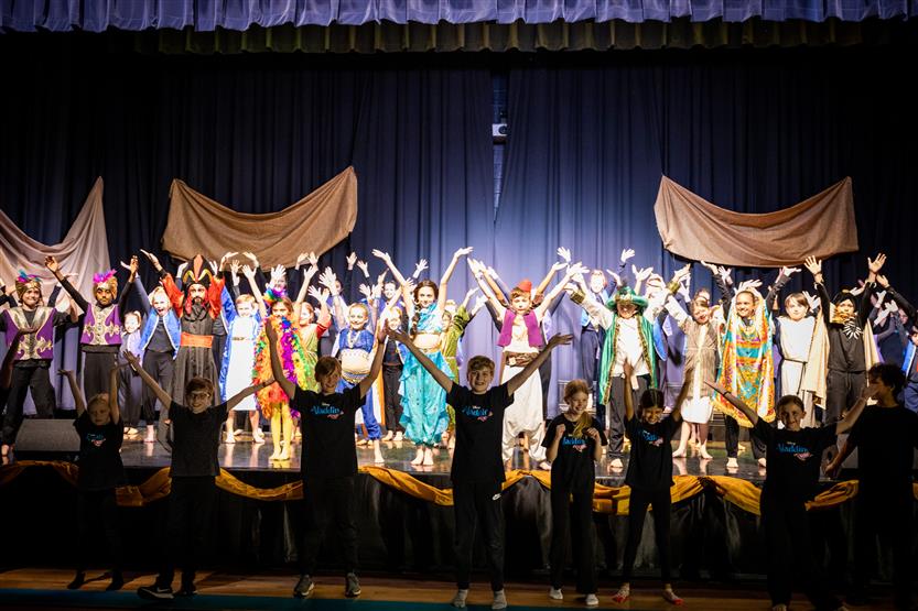 Students dressed in Aladdin costumes